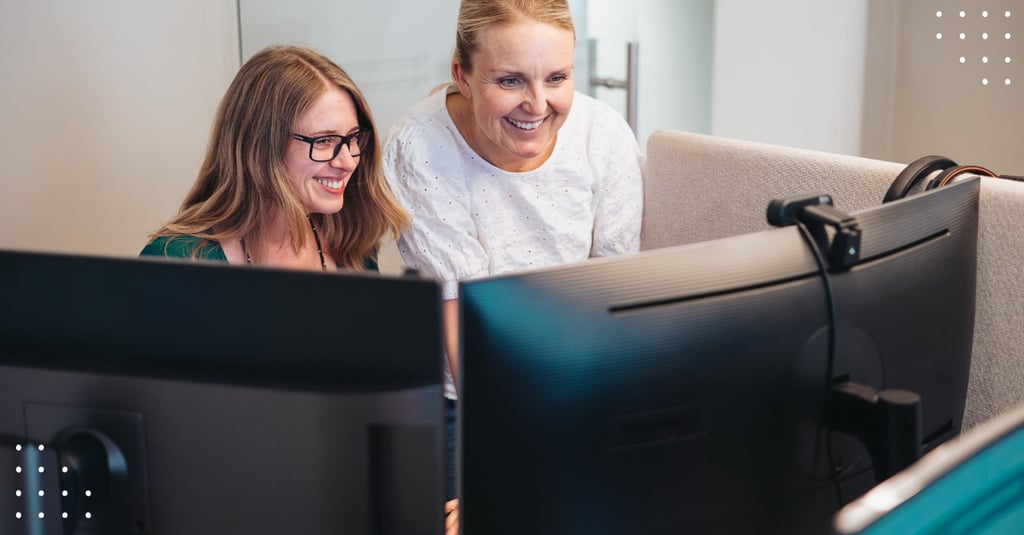 Photo of two female colleagues in the office
