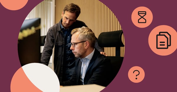 Picture of two men working in a office