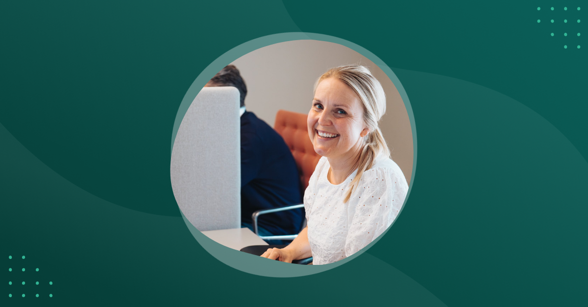 Woman sitting in front of a computer in the office