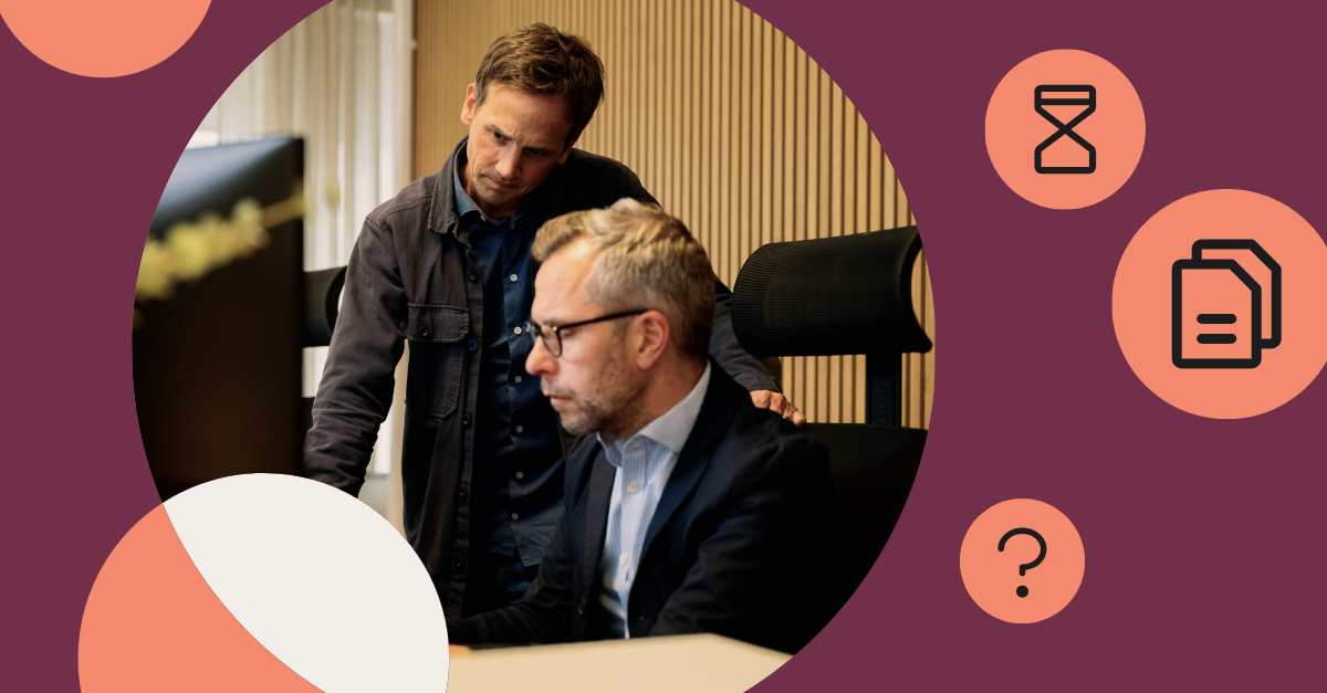 Picture of two men working in a office