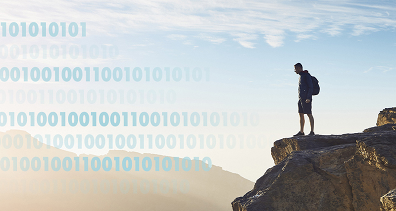 Man standing on mountain top